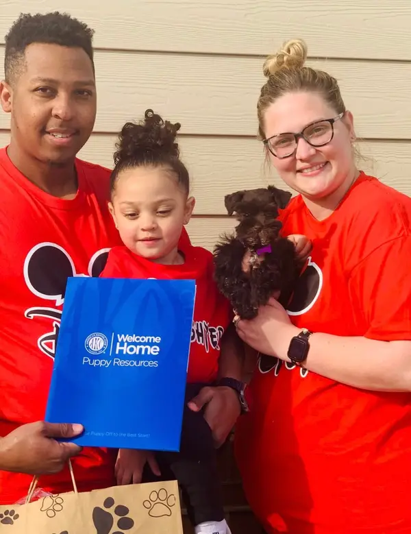 A Showtime Pups puppy with its new family