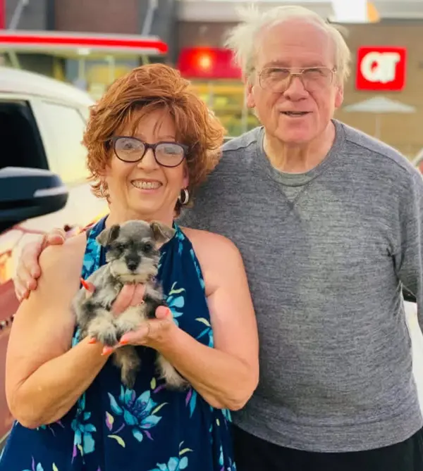 A Showtime Pups puppy with its new family