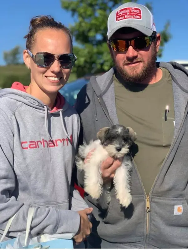 A Showtime Pups puppy with its new family