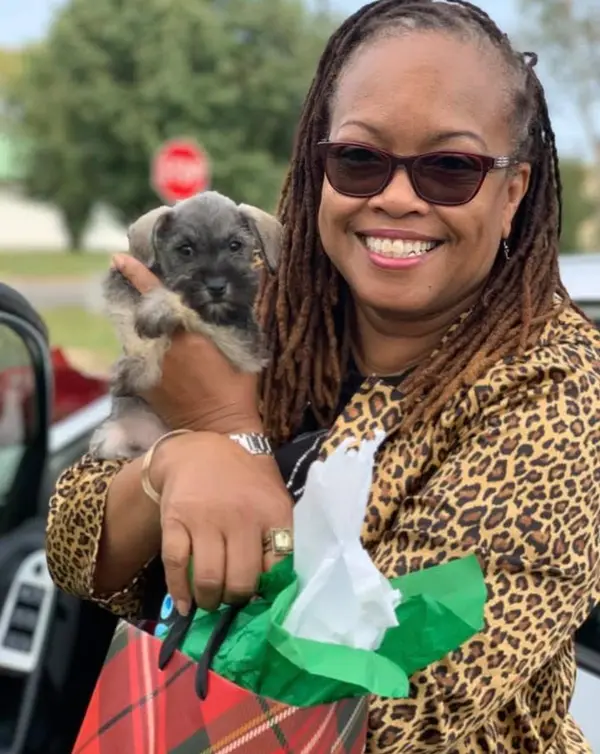 A Showtime Pups puppy with its new family