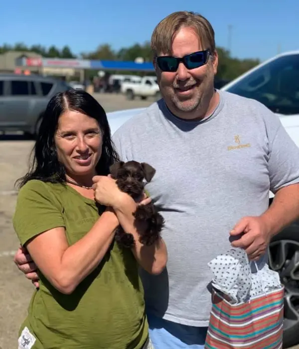 A Showtime Pups puppy with its new family