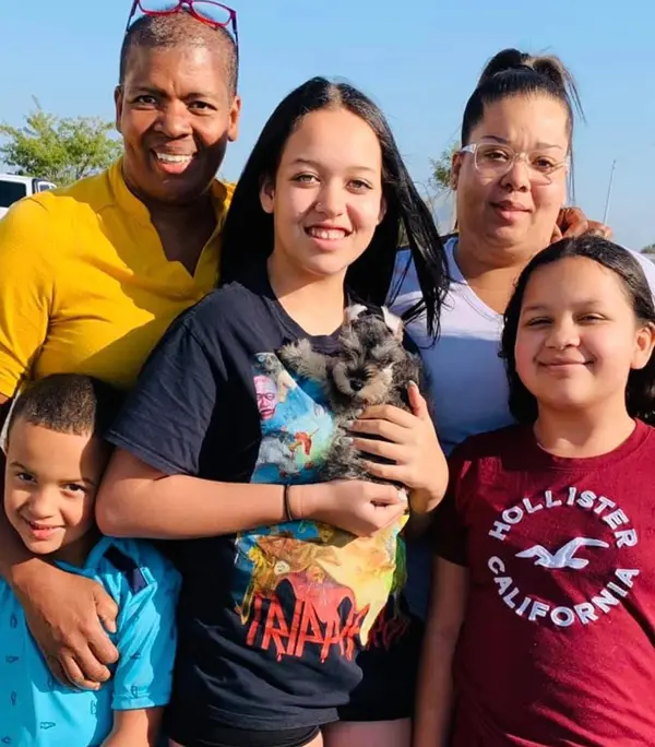 A Showtime Pups puppy with its new family