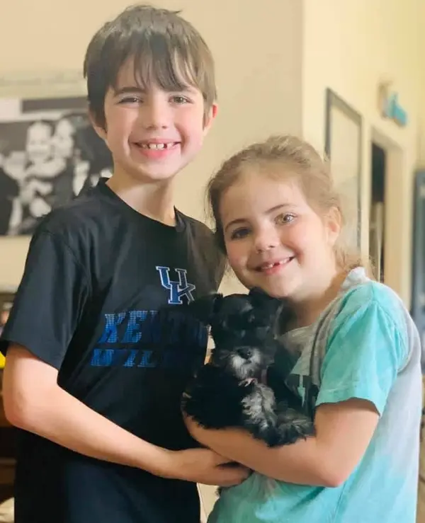 A Showtime Pups puppy with its new family