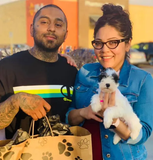 A Showtime Pups puppy with its new family