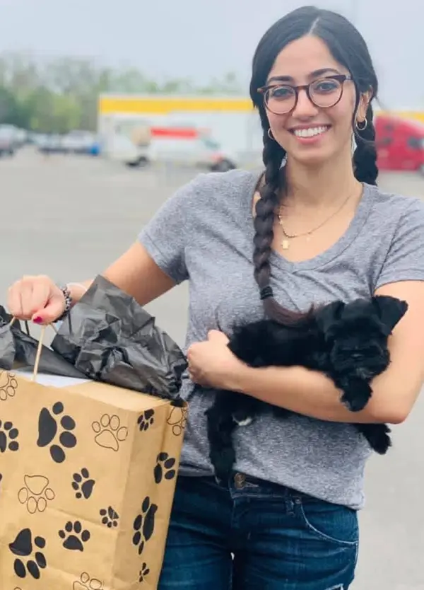 A Showtime Pups puppy with its new family