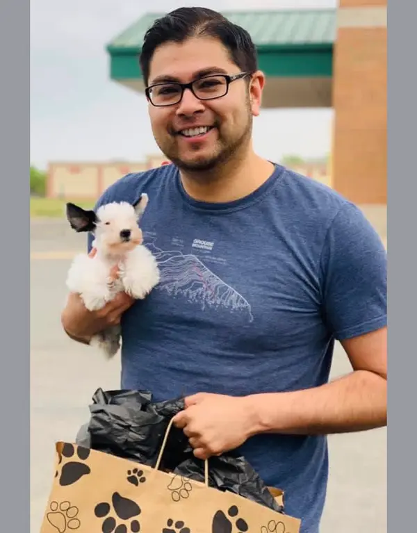 A Showtime Pups puppy with its new family