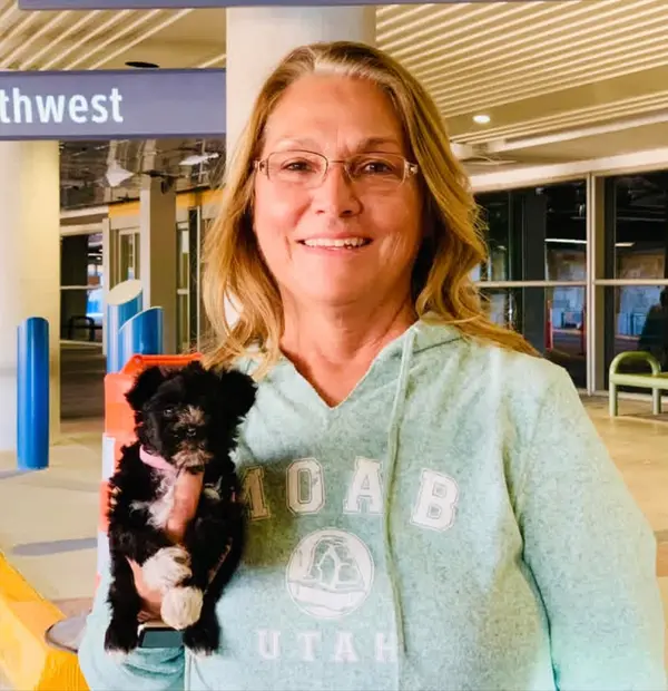 A Showtime Pups puppy with its new family