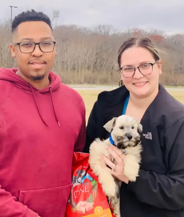 A Showtime Pups puppy with its new family