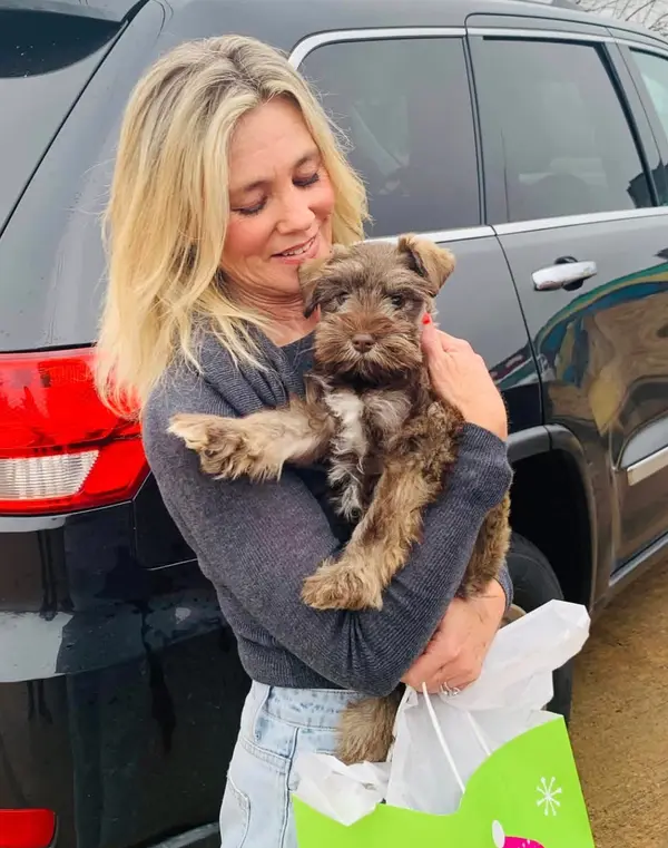 A Showtime Pups puppy with its new family