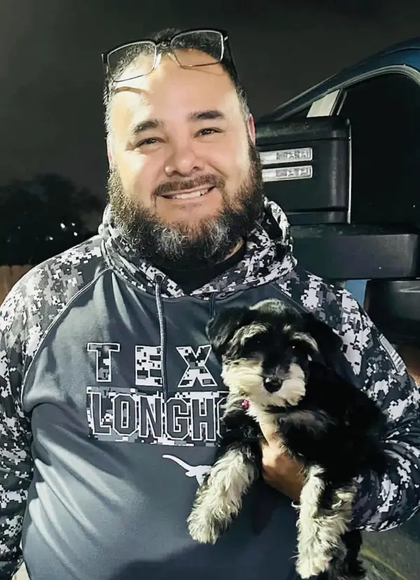 A Showtime Pups puppy with its new family