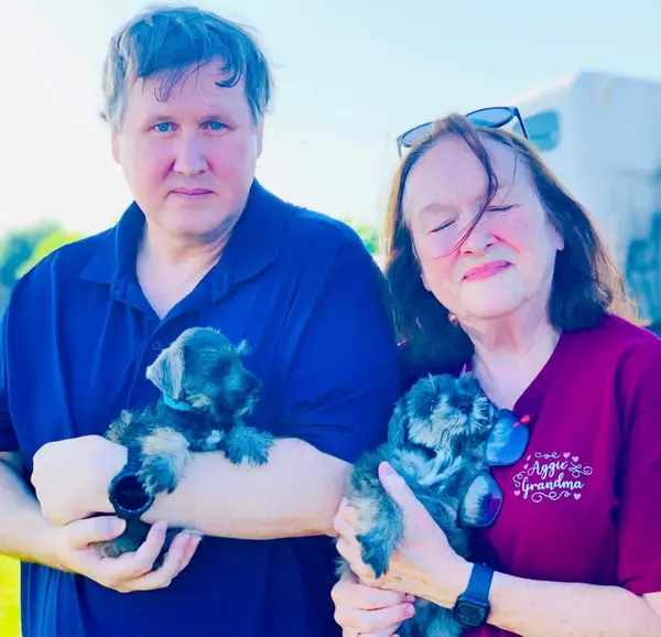 A Showtime Pups puppy with its new family
