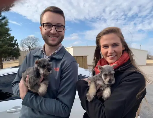A Showtime Pups puppy with its new family