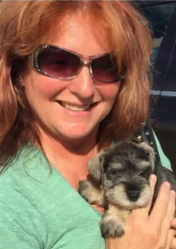 A Showtime Pups puppy with its new family