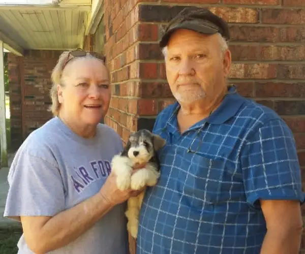 A Showtime Pups puppy with its new family