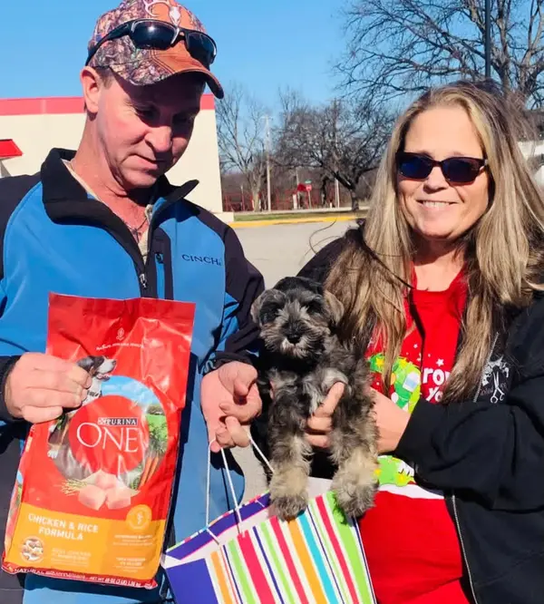 A Showtime Pups puppy with its new family
