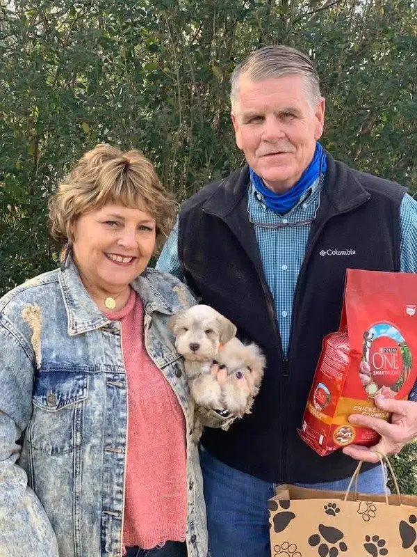 A Showtime Pups puppy with its new family