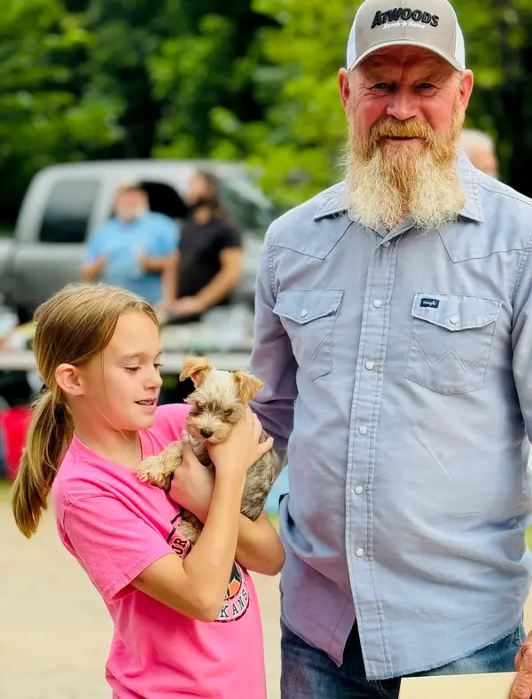 A Showtime Pups puppy with its new family