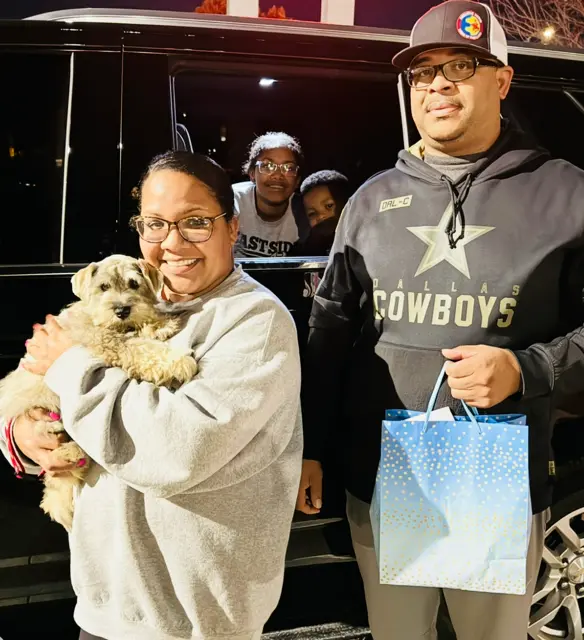 A Showtime Pups puppy with its new family