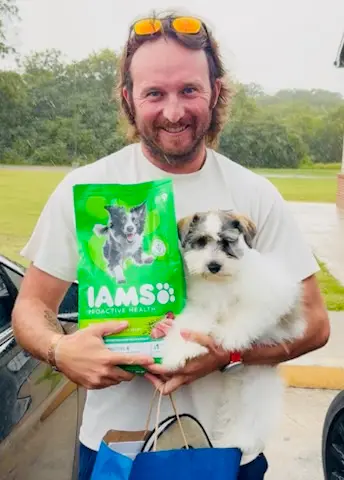 A Showtime Pups puppy with its new family