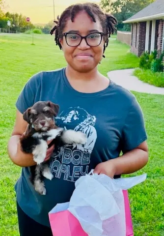 A Showtime Pups puppy with its new family