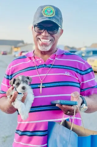 A Showtime Pups puppy with its new family