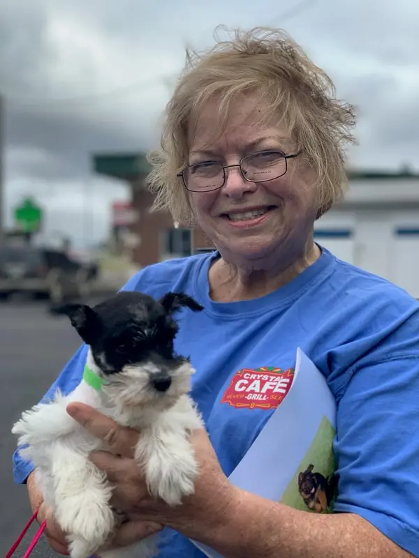 A Showtime Pups puppy with its new family